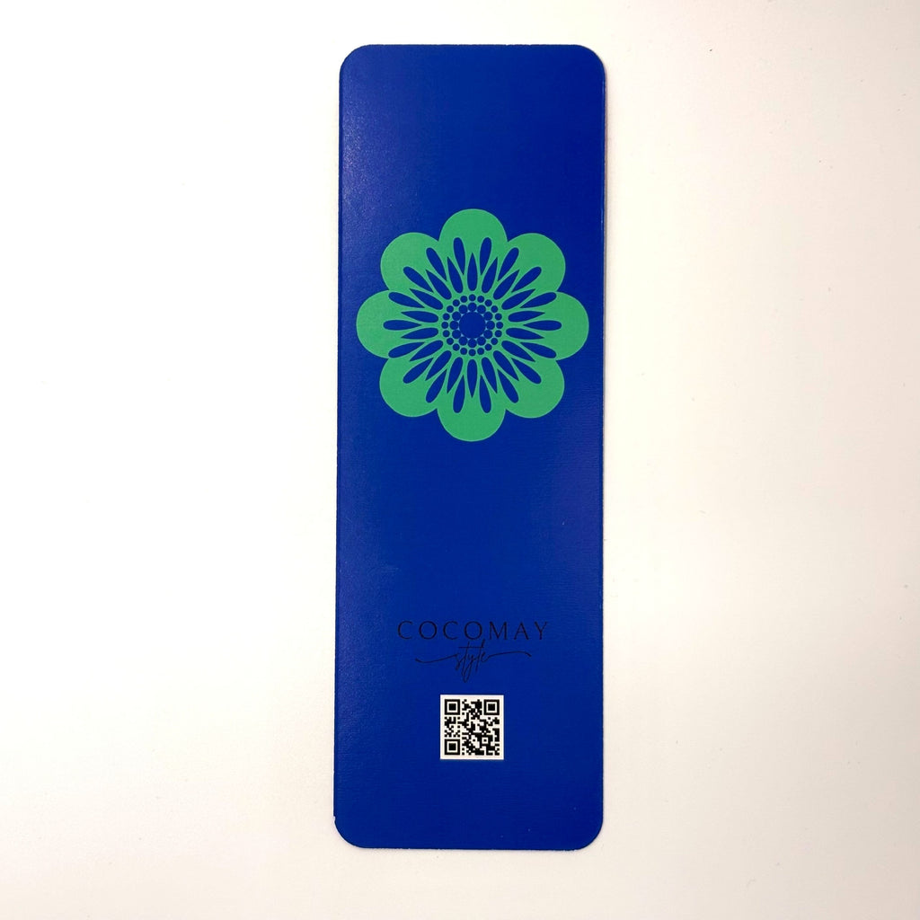 Bookmark with teal floral on a dark blue background