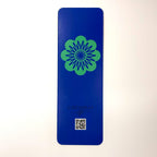 Bookmark with teal floral on a dark blue background