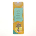 Bookmark with cactus and abstract illustrations and motivational quote "keep your mind sharp - read books!" on a yellow background