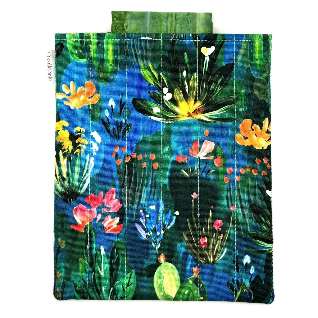 E-Reader sleeve with colorful floral and plant pattern on a blue background