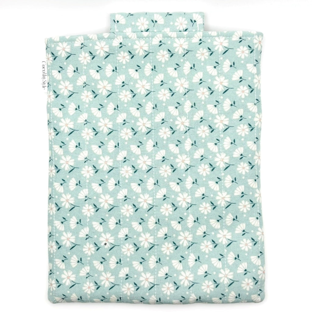 E-Reader sleeve with floral patterned fabric on a light blue background