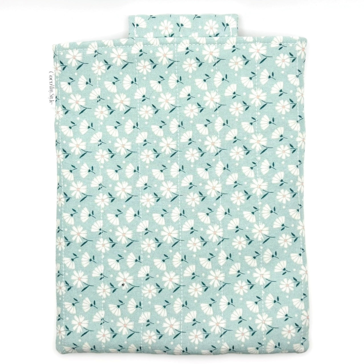 E-Reader sleeve with floral patterned fabric on a light blue background