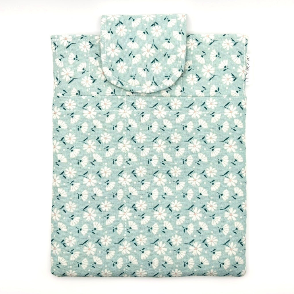 E-Reader sleeve with floral patterned fabric on a light blue background