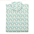 E-Reader sleeve with floral patterned fabric on a light blue background