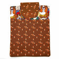 E-Reader sleeve with patterned dogs wearing hats, glasses, and scarves