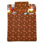 E-Reader sleeve with patterned dogs wearing hats, glasses, and scarves