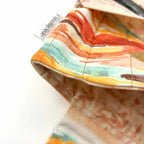 Close-up of e-Reader sleeve with cowboy boot and hat design