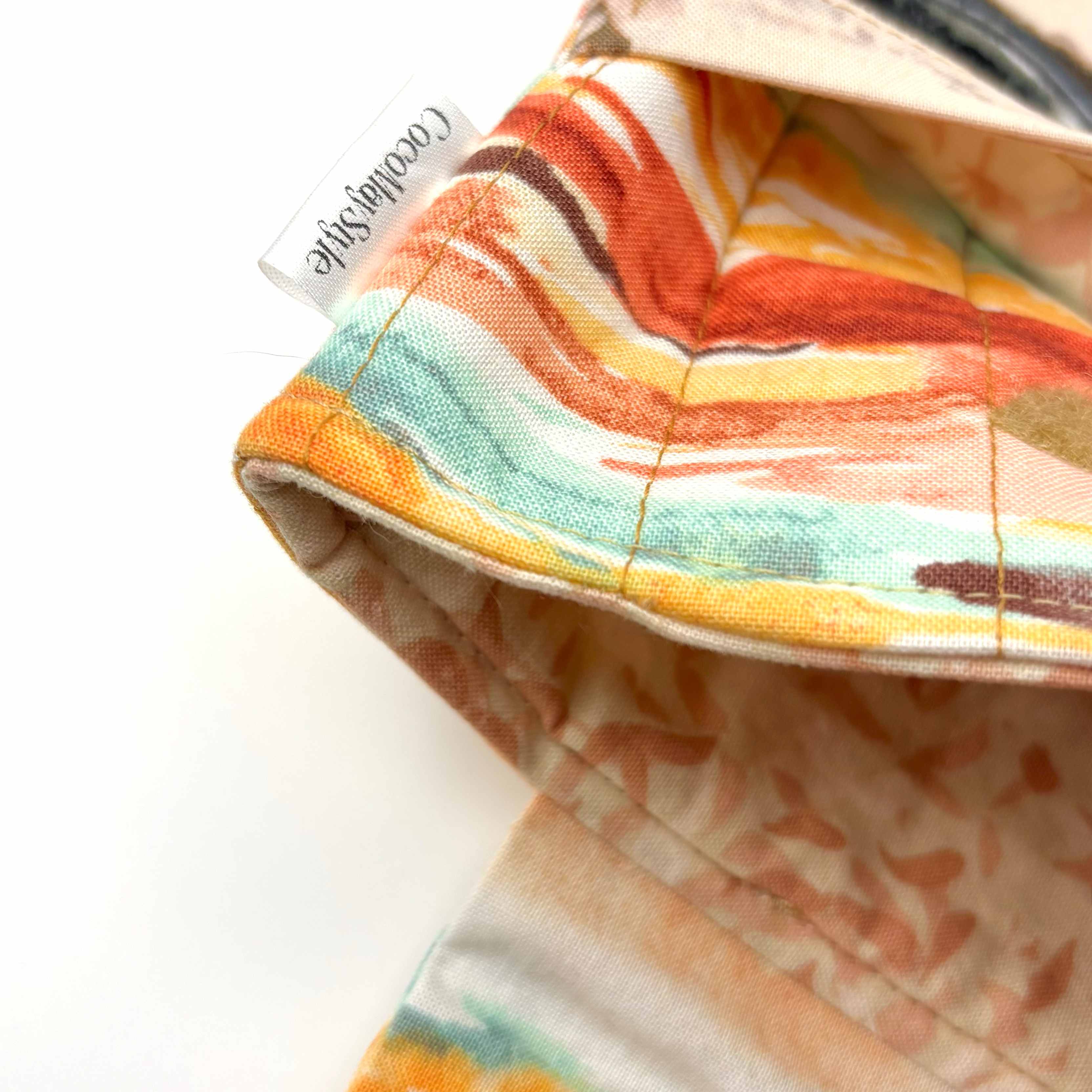 Close-up of e-Reader sleeve with cowboy boot and hat design