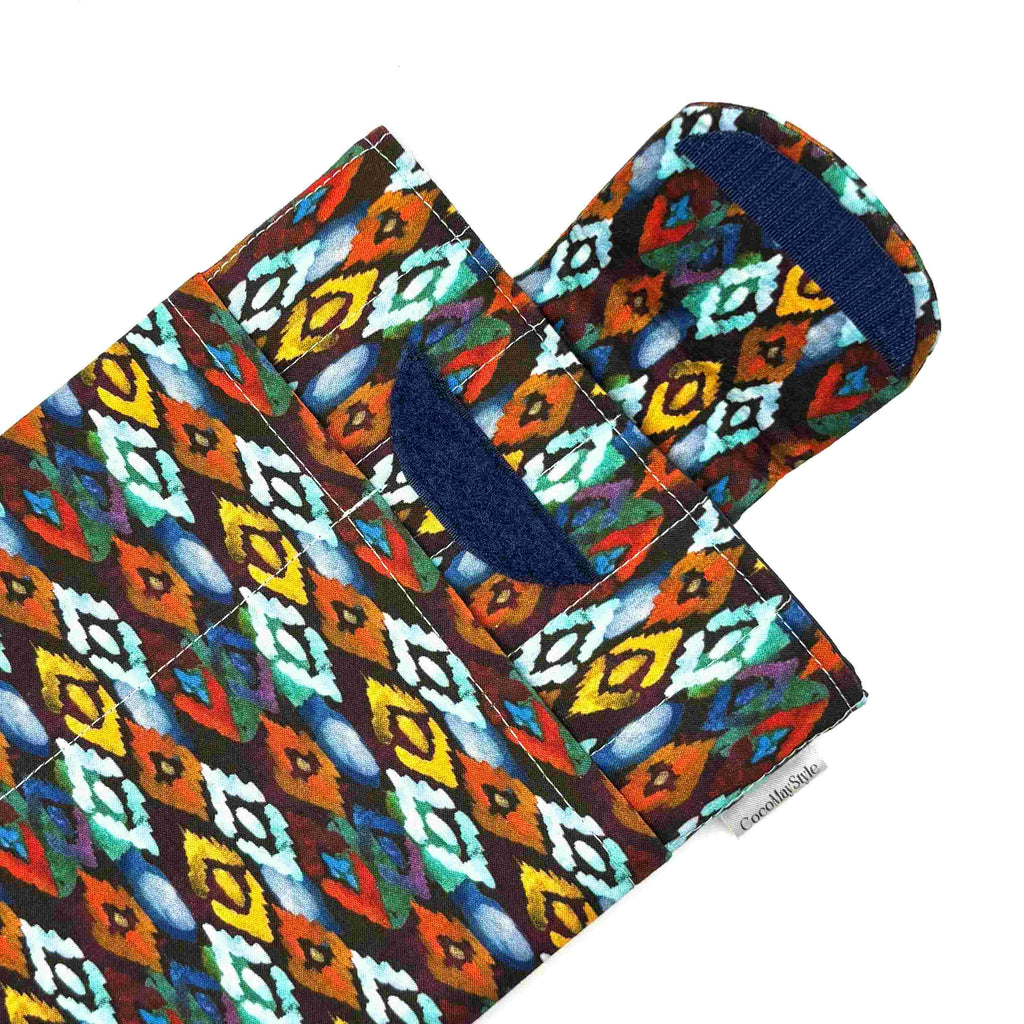 E-Reader sleeve with colorful diamond patterned fabric showing open velcro flap