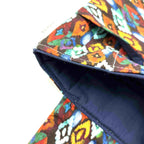 Close-up of e-Reader sleeve with colorful diamond patterned fabric
