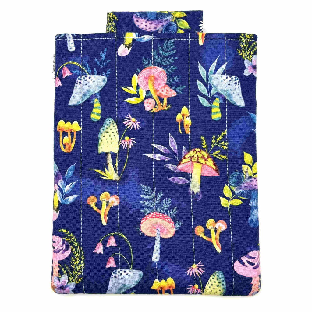 E-Reader sleeve with mushroom and foliage design on a blue background