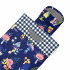 E-Reader sleeve with mushroom and foliage design on a blue background showing the open velcro flap