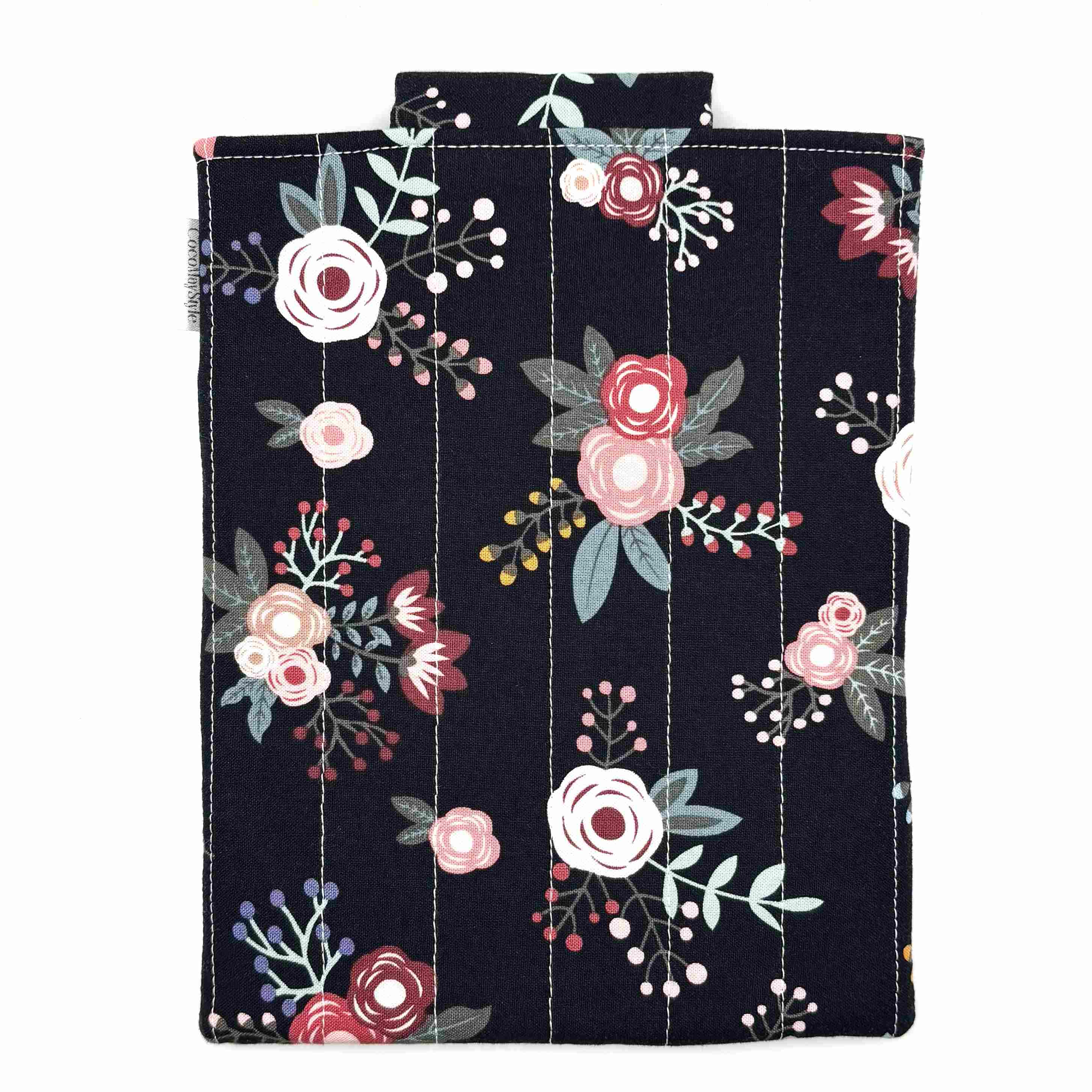 E-Reader sleeve with pink florals on a black background