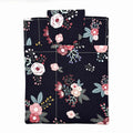 E-Reader sleeve with pink florals on a black background