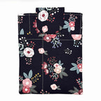 E-Reader sleeve with pink florals on a black background