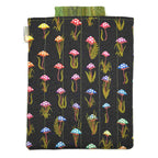 E-Reader sleeve with mushroom and foliage design on a black background