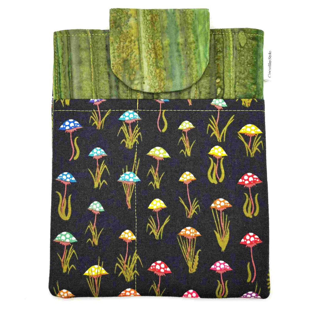 E-Reader sleeve with mushroom and foliage design on a black background
