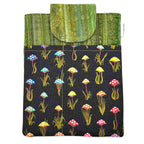 E-Reader sleeve with mushroom and foliage design on a black background