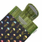 E-Reader sleeve with mushroom and foliage design on a black background showing open velcro flap