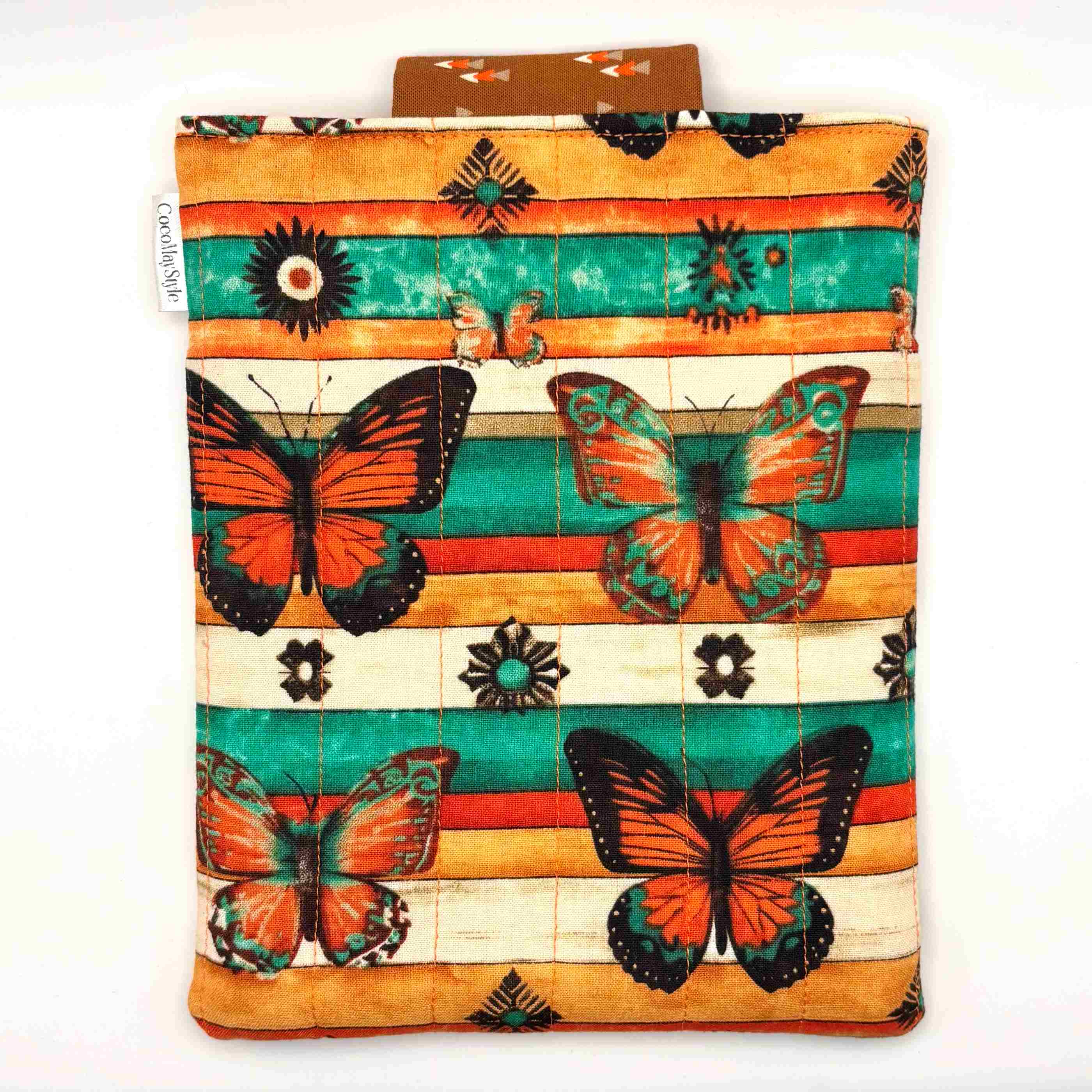 E-Reader sleeve with butterfly design on a striped background