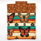 E-Reader sleeve with butterfly design on a striped background