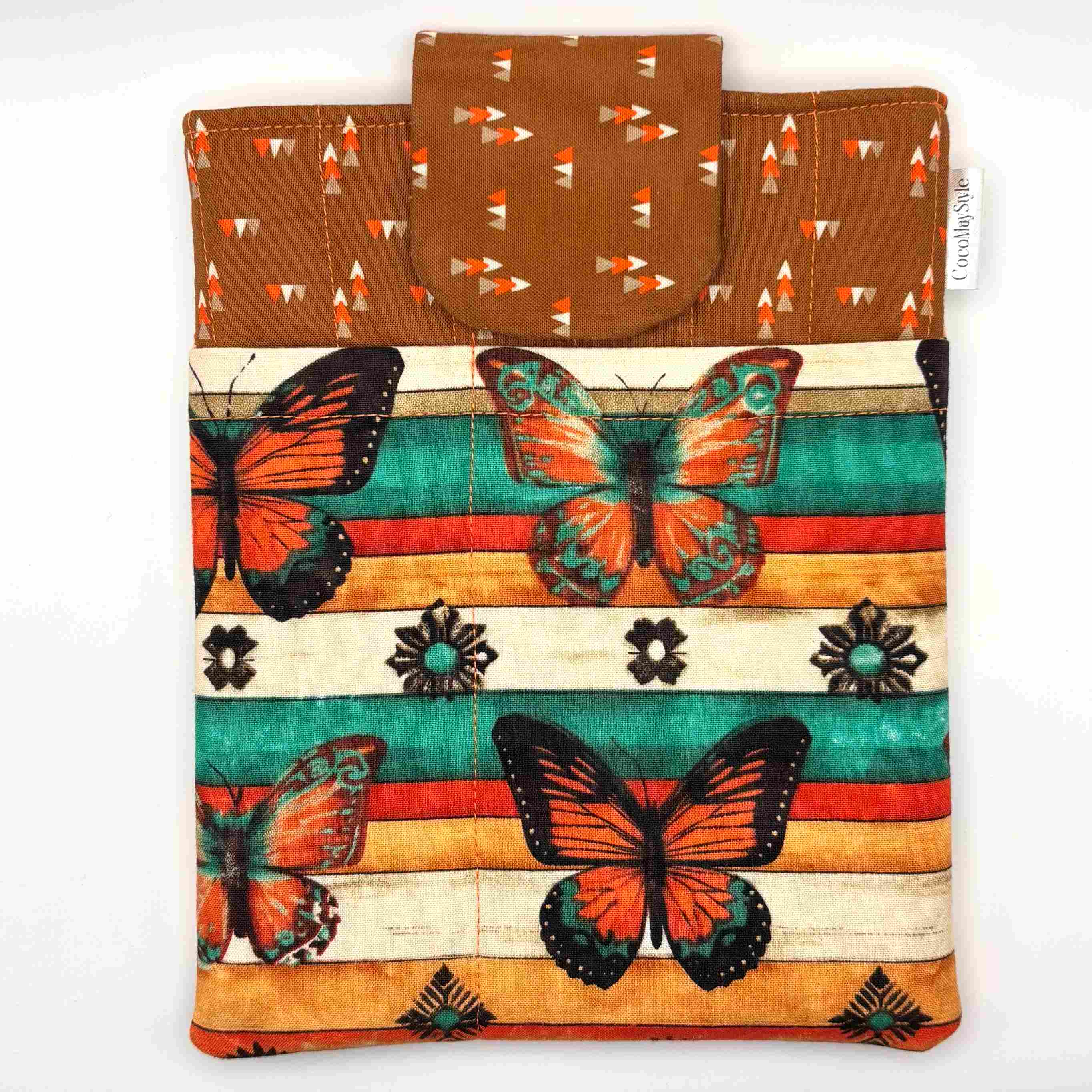E-Reader sleeve with butterfly design on a striped background