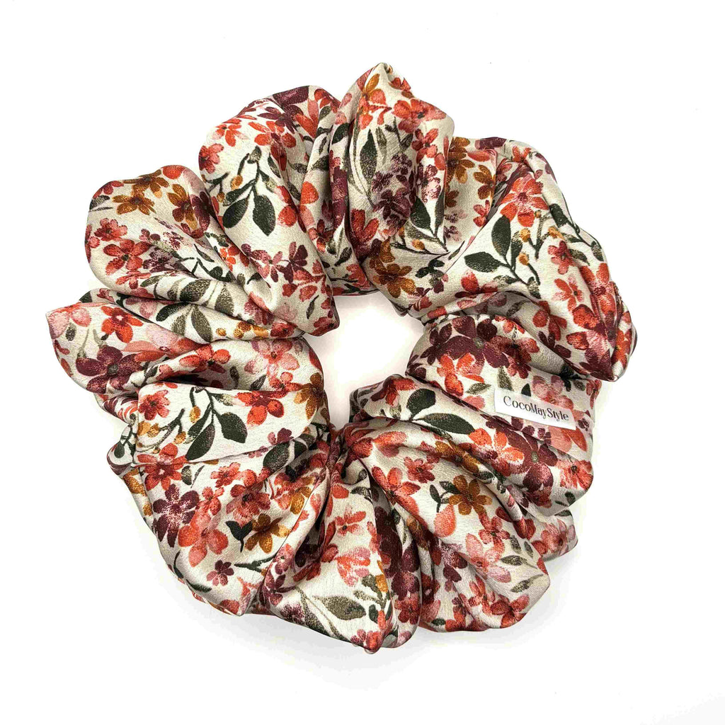 Floral satin scrunchie on a white background