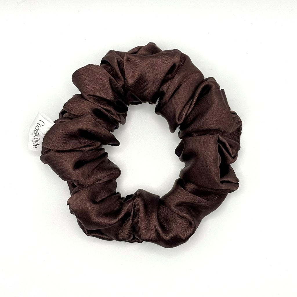 Dark brown satin scrunchie on a white background