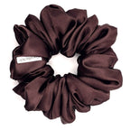 Brown satin scrunchie on a white background