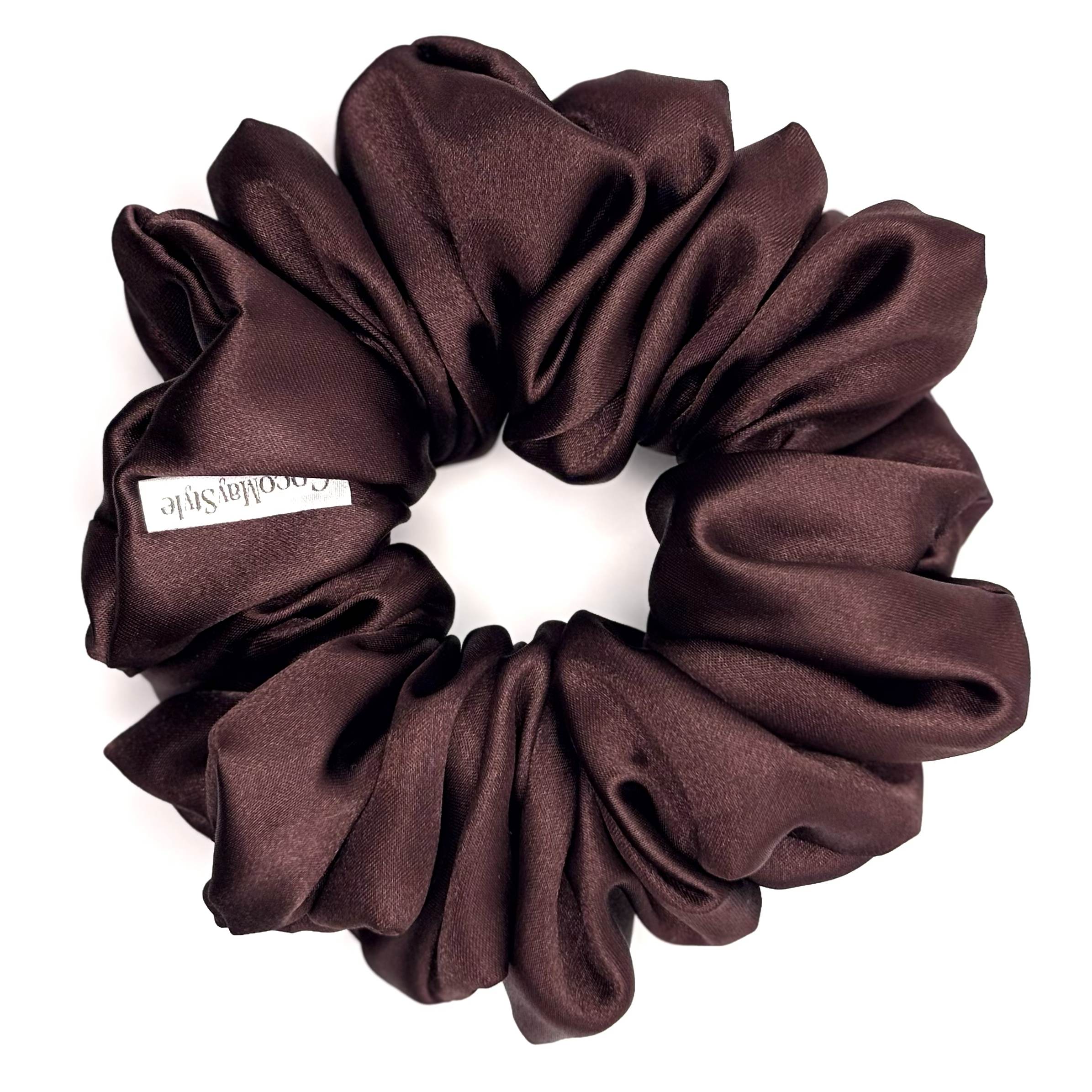 Brown satin scrunchie on a white background