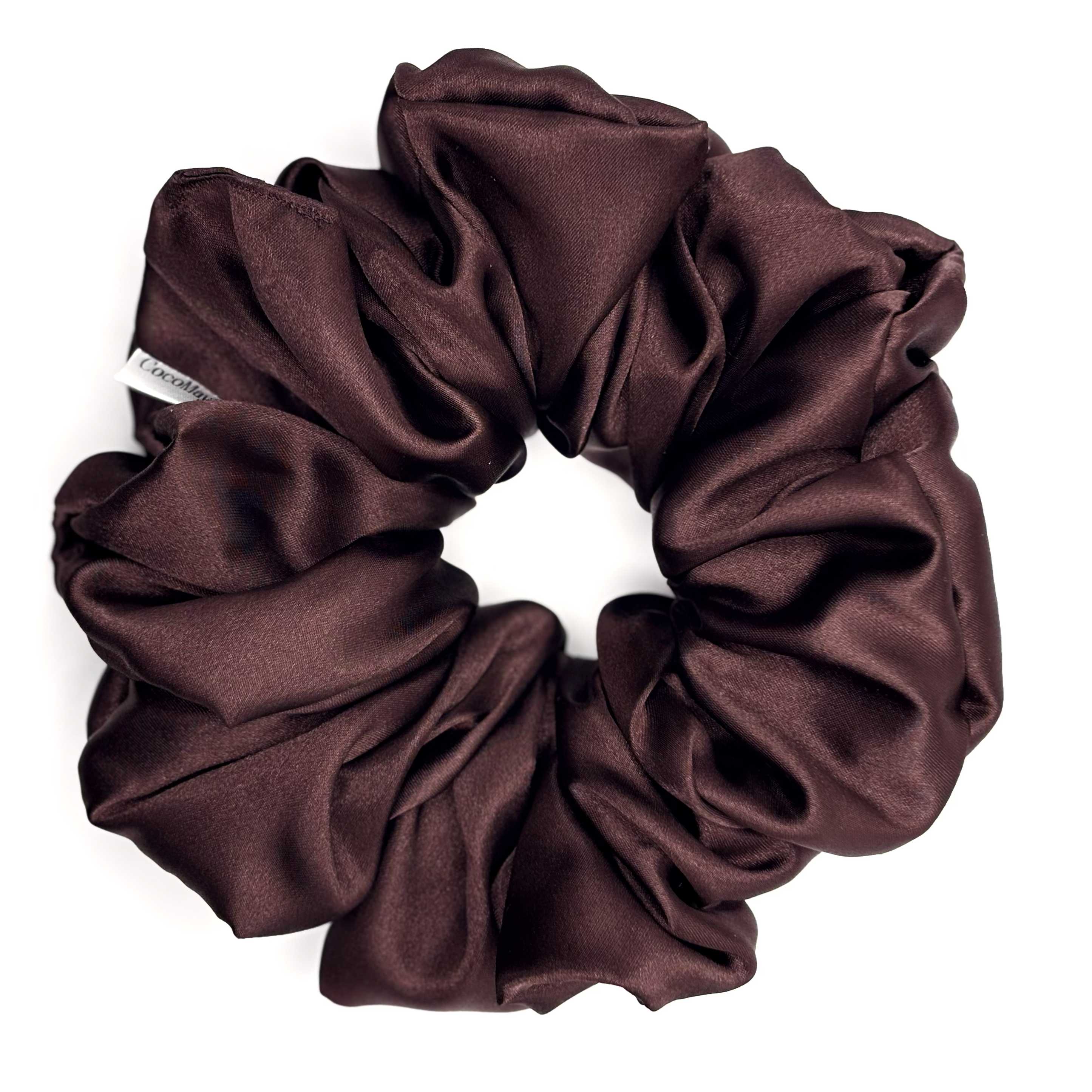 Brown satin scrunchie on a white background