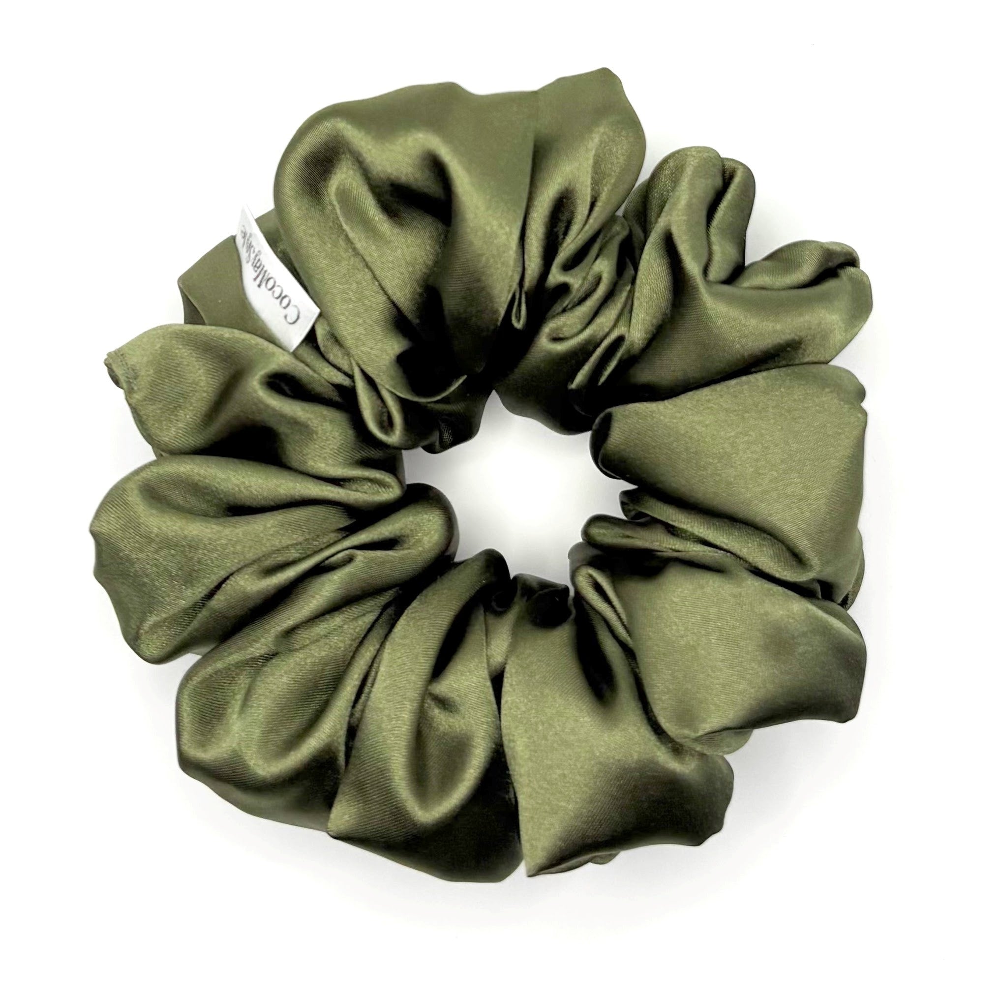 Olive green satin scrunchie on a white background