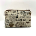 Zipper pouch with coffee words and graphics on a tan brown background