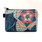 Zipper pouch with a colorful mandala pattern on a dark blue background