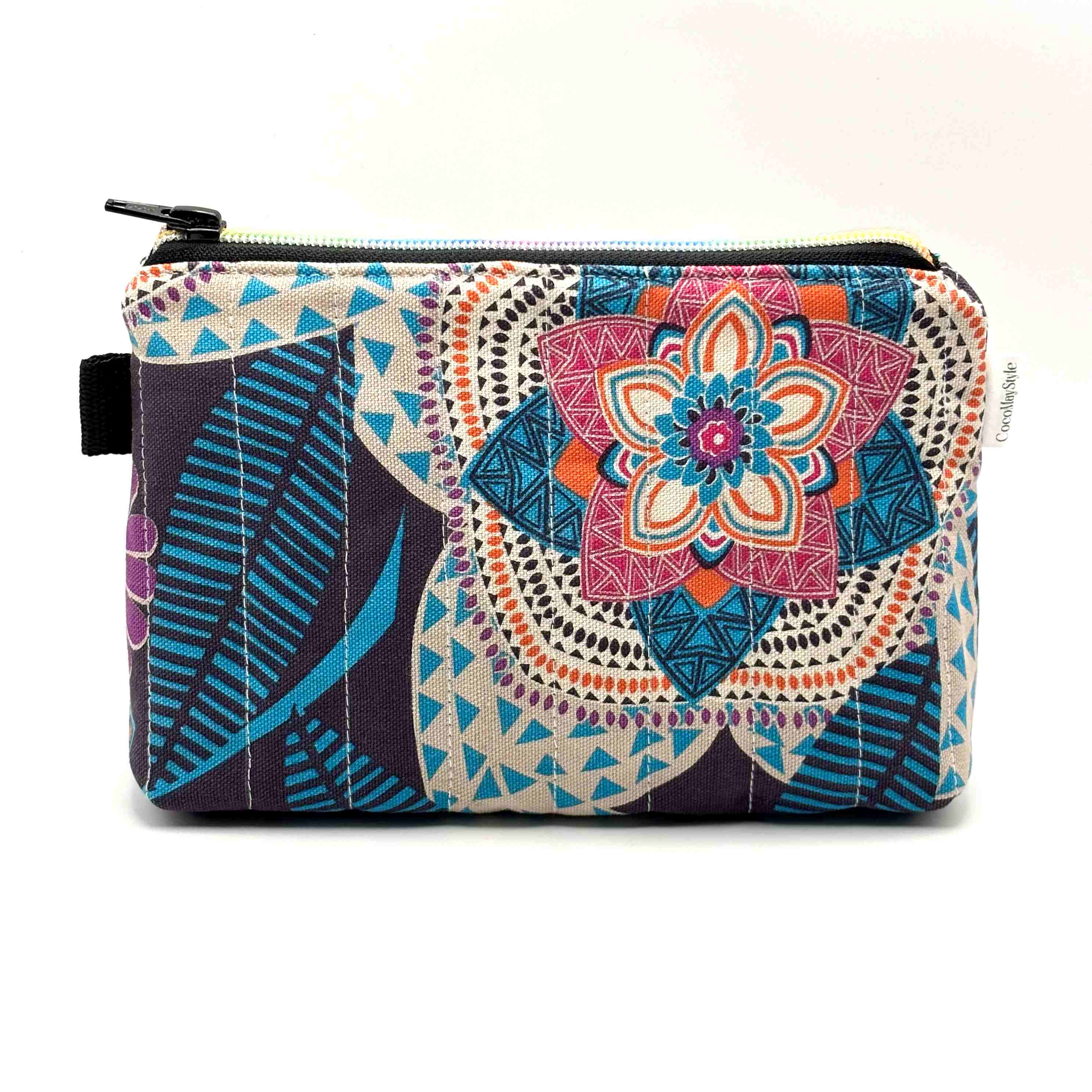Zipper pouch with a colorful mandala pattern on a dark blue background
