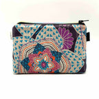 Zipper pouch with a colorful mandala pattern on a dark blue background