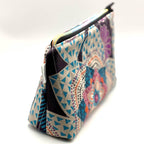 Zipper pouch with a colorful mandala pattern on a dark blue background