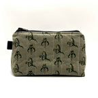 Zipper pouch with a green Mandalorian mudhorn pattern on a tan background