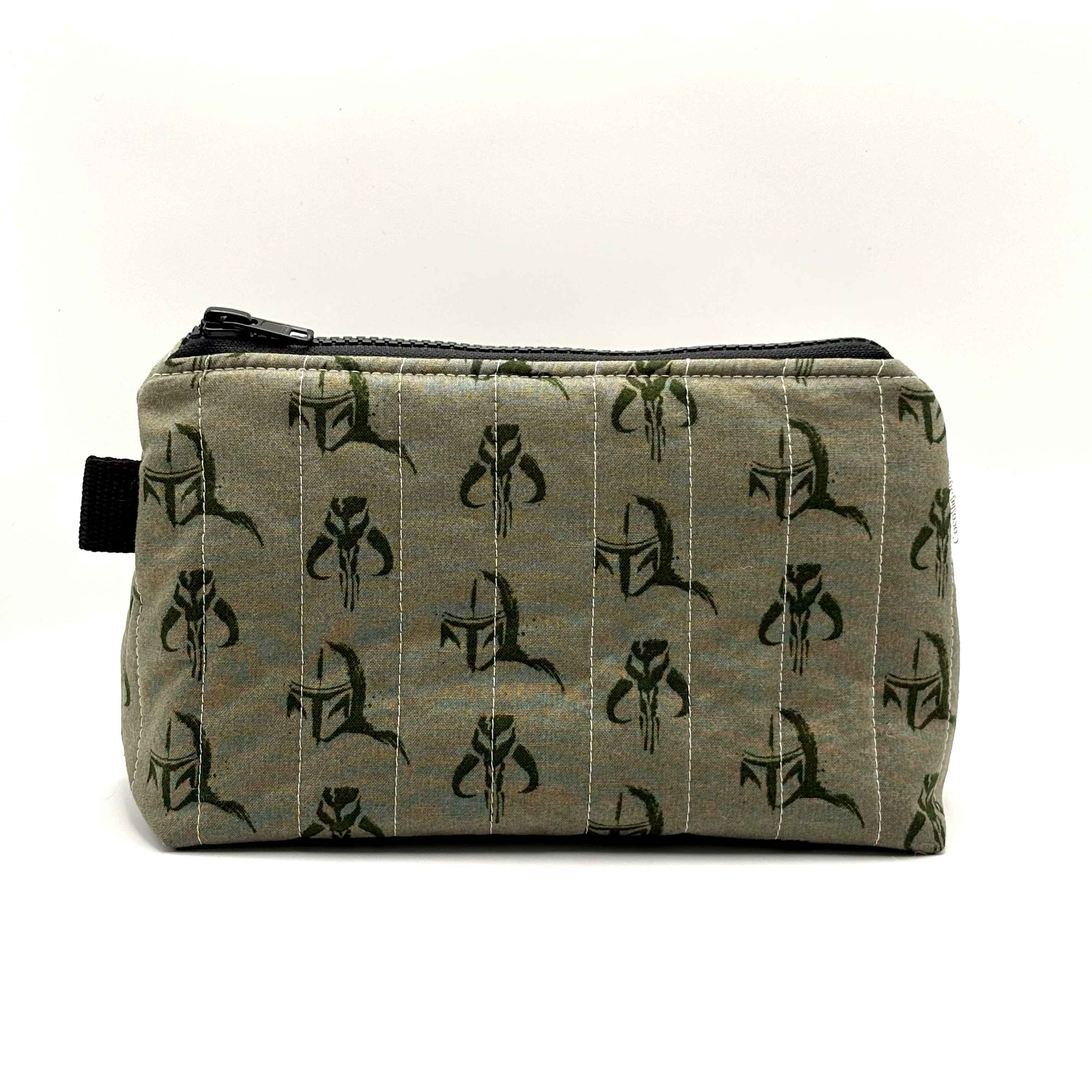 Zipper pouch with a green Mandalorian mudhorn pattern on a tan background